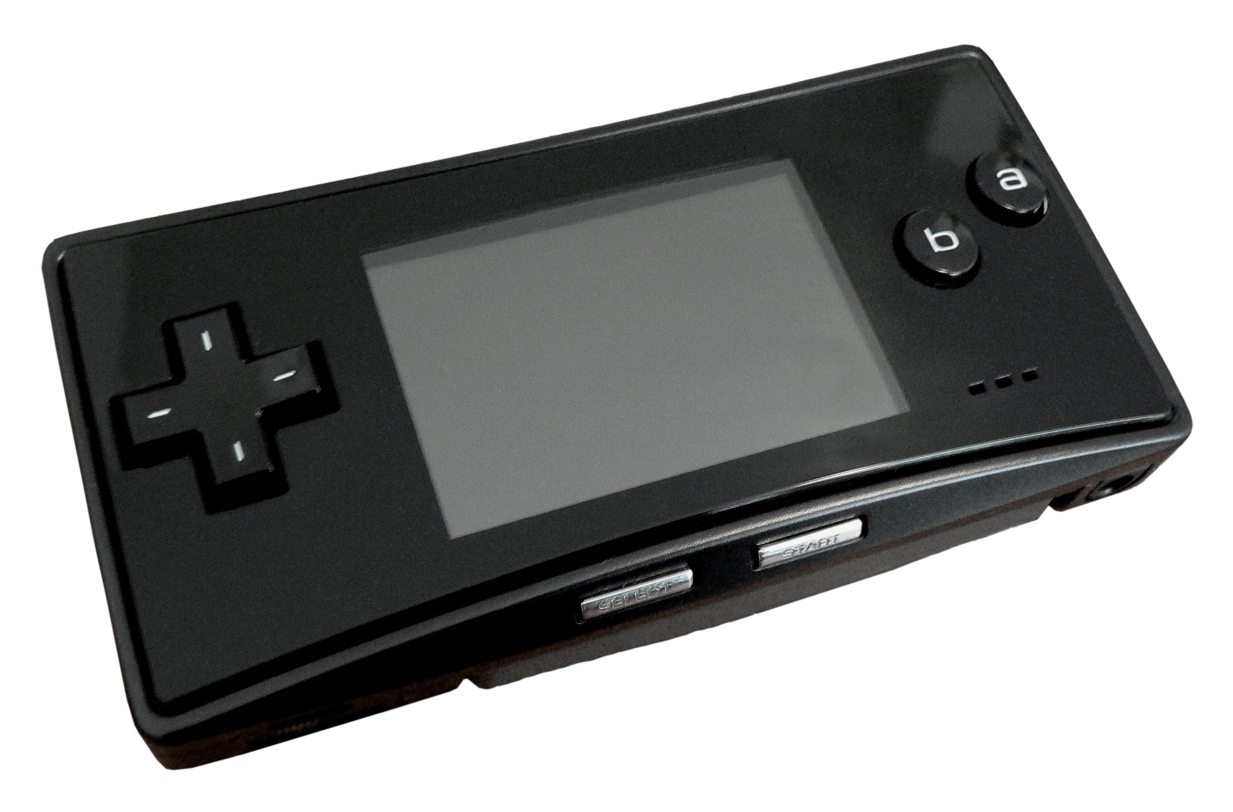 A Nintendo Game Boy Micro, all-black Japanese variant, photographed on a plain white background. Smaller than a chocolate bar, with a 2-inch screen and the GBA cartridge slot at the top edge.